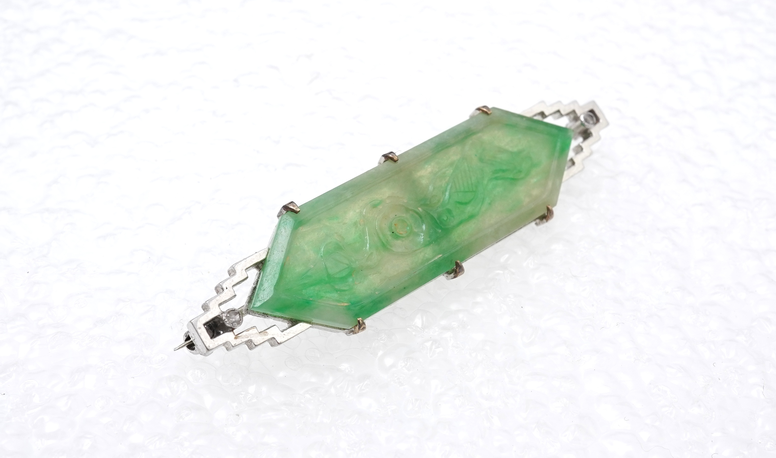 An Art Deco jadeite brooch, 1930s